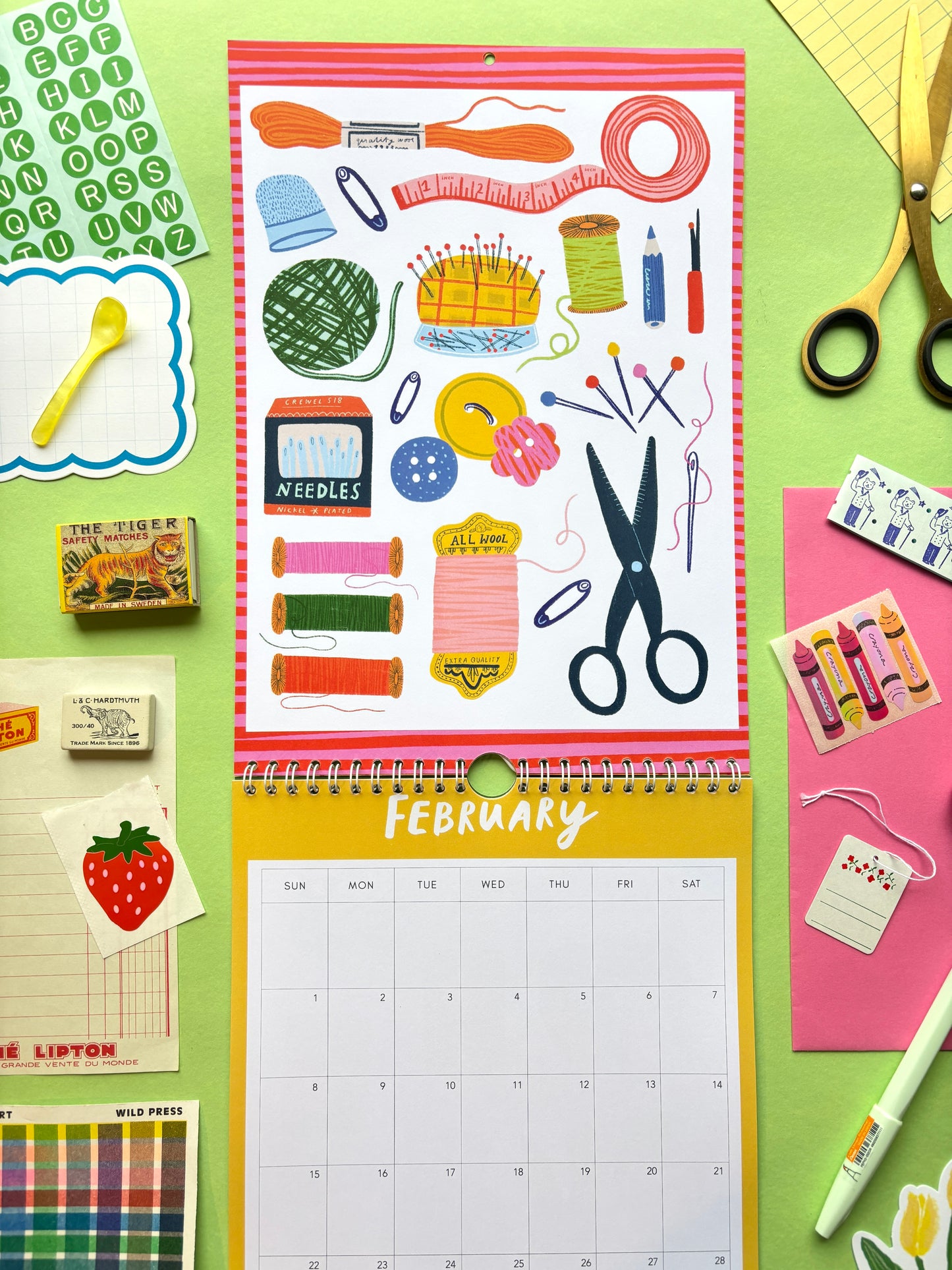 Calendar with craft-themed illustrations on a colorful background