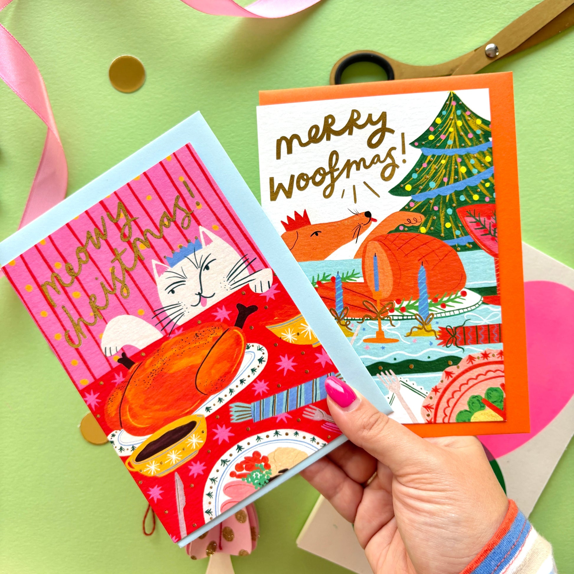 ‘Meowy Christmas’ funny cat Christmas card showing a naughty cat licking its lips at a festive dinner table with turkey and gold foil details