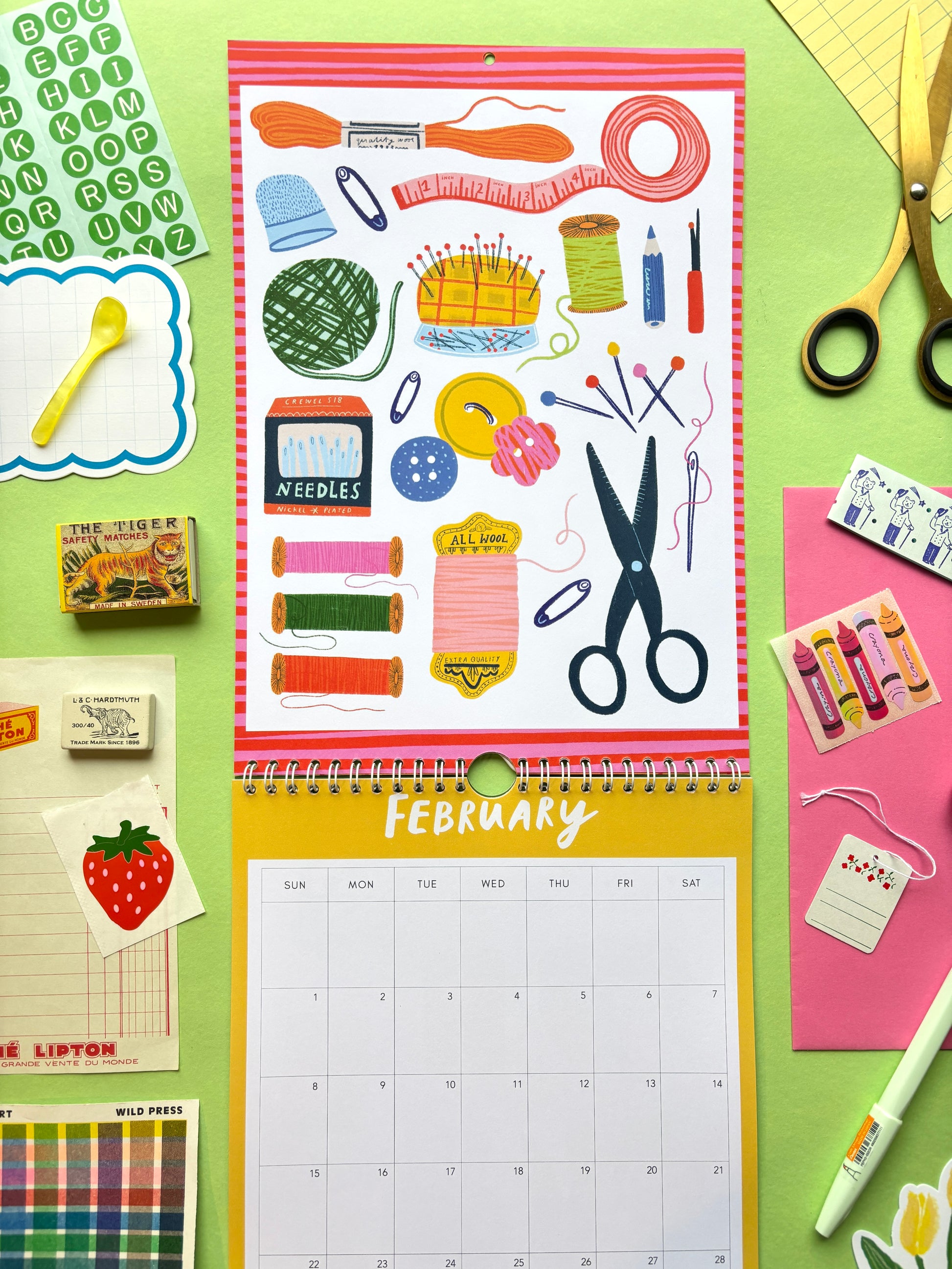 Calendar with craft-themed illustrations on a colorful background